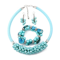 White Shell, Simulated Pearl Earrings, Stretch Bracelet and Necklace 18 Inches in Stainless Steel