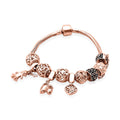 Multi Charms Bracelet in 14K Rose Gold Over Sterling Silver (7.50 In) 31.90 Grams - Sticky add to cart bar