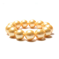 Ankur Treasure Chest Golden Color Shell Pearl Stretch Bracelet