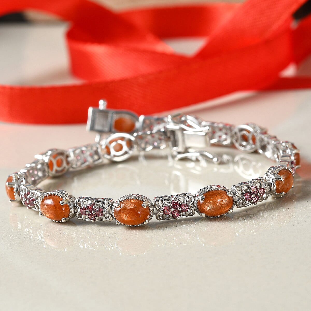 10.45 ctw Korevora Sunstone and Orissa Rose Garnet Bracelet in Platinum Over Sterling Silver (7.25 In) 11.30 Grams