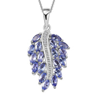2.50 ctw Tanzanite and Zircon Feather Pendant in Platinum Over Sterling Silver