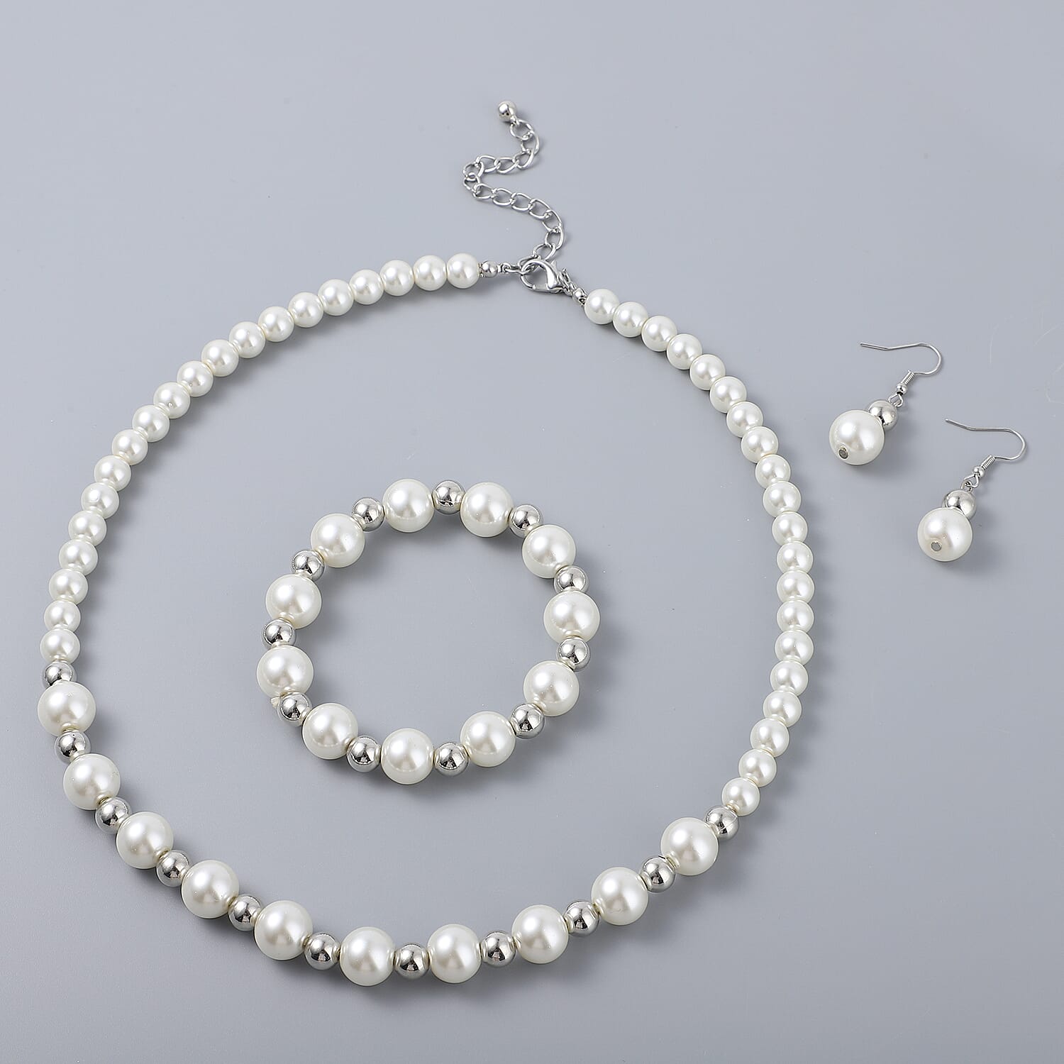 Simulated White Pearl and Resin Stretch Bracelet and Earring and Necklace 21-23 Inches in Silvertone & Stainless Steel