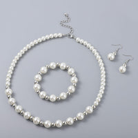Simulated White Pearl and Resin Stretch Bracelet and Earring and Necklace 21-23 Inches in Silvertone & Stainless Steel