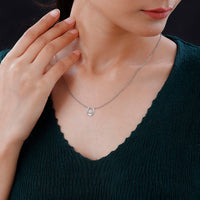 Simulated Diamond Dancing Horseshoe Pendant Necklace 20 Inches in Rhodium Over Sterling Silver 1.00 ctw