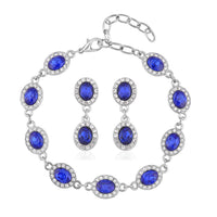 Simulated Blue Sapphire and White Austrian Crystal Bracelet (7.50In) and Earrings in Silvertone