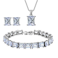 3 Piece Set - Light Blue Crystal Bracelet, Solitaire Stud Earrings and Pendant in Silvertone with Stainless Steel Necklace (20 Inches)