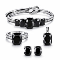 Thai Black Spinel 46.75 ctw Solitaire Earrings, Ring (Size 8.0), Bangle Bracelet (6.5 In) and Pendant without Chain in Stainless Steel