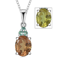 D'Joy Autumn Alexite and Kagem Zambian Emerald 2.00 ctw Oval Art Deco Pendant Necklace in Platinum Over Sterling Silver 20 Inches