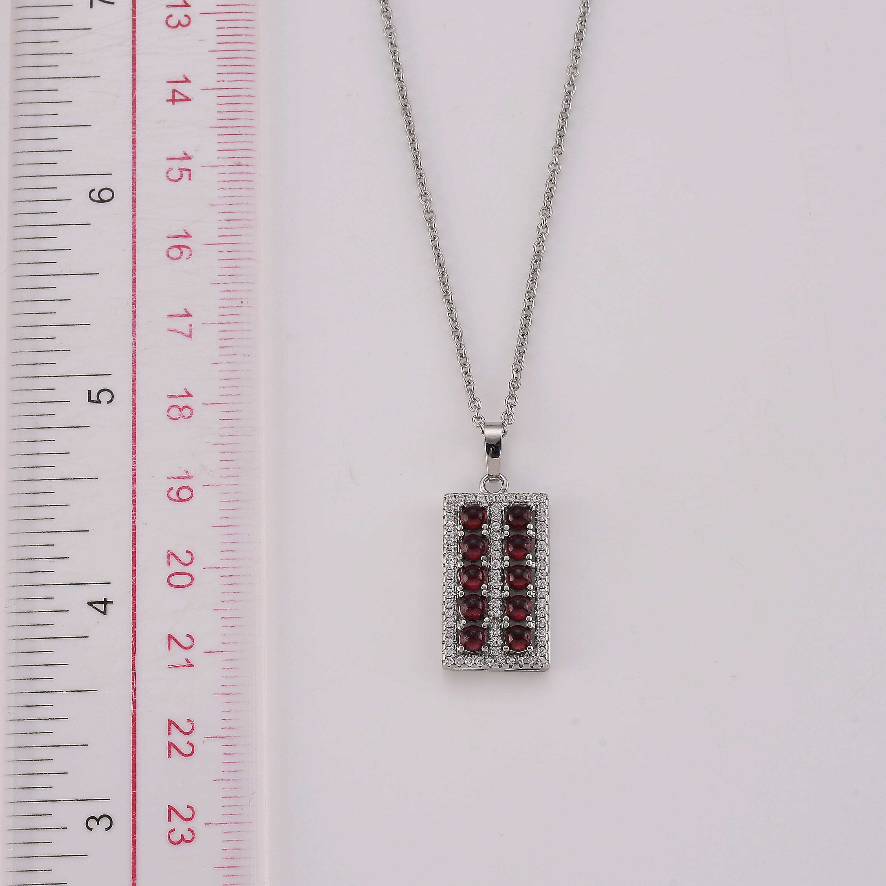 Mozambique Garnet and Simulated Diamond 1.30 ctw Pendant in Silvertone with Stainless Steel Necklace (20 Inches)