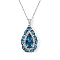 D''Joy London Blue Topaz and Moissanite 8.70 ctw Pendant Necklace in Rhodium Over Sterling Silver 20 Inches