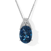 Certified & Appraised D''Joy Premium London Blue Topaz and Moissanite 7.15 ctw Pendant Necklace in Rhodium Over Sterling Silver 20 Inches
