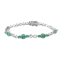 2.75 ctw AAA Kagem Zambian Intense Green Emerald and White Zircon Bracelet in Rhodium Over Sterling Silver (7.25 In) 8.60 Grams