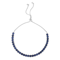 Simulated Blue Diamond Bolo Bracelet in Silvertone