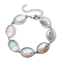 Simulated Blue Magic Color Topaz Disco Ball Theme Oval Charm Station Bracelet in Stainless Steel (7.50 In)