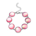 Simulated Pink Magic Color Topaz Seashell Charm Station Bracelet in Stainless Steel (7.25 In) - Sticky add to cart bar