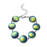 Simulated Pink Magic Color Topaz Seashell Charm Station Bracelet in Stainless Steel (7.25 In)