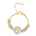 Strada Blue and White Crystal Japanese Movement Charm Bracelet Watch in Goldtone (up to 10.5 inches) - Sticky add to cart bar