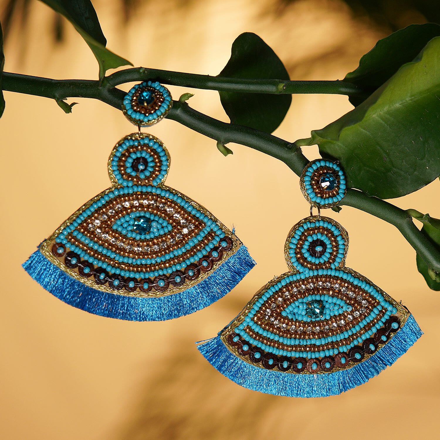 Handcrafted White Seed Beaded Evil Eye Theme Earrings in Goldtone