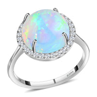 Inspired by a halo design, this AAA Ethiopian Welo Opal ring symbolizes sanctity and perfection. Halo rings are popular throughout history for their uniqueness in illuminating the gemstone i