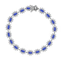 AAA Tanzanite and Moissanite Bracelet in Platinum Over Sterling Silver (7.25 In) 13.50 Grams 7.40 ctw - Sticky add to cart bar