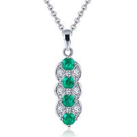 Emerald and White Zircon 0.94 ctw Pendant in Rhodium Over Sterling Silver