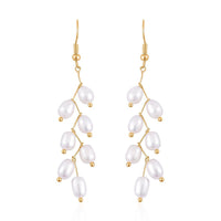 White Freshwater Pearl Dangle Earrings in Goldtone