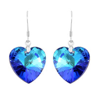 Simulated Blue Sapphire Heart Dangle Earrings in Rhodium Over Sterling Silver