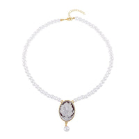 Cameo and White Shell Pearl Necklace 21-23 Inches in Goldtone 8.00 ctw