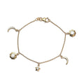 Moissanite Celestial Moon, Sun and Stars Charm Bracelet in Vermeil Yellow Gold Over Sterling Silver (7.25 In) 1.15 ctw - Sticky add to cart bar