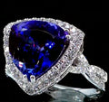 Certified and Appraised Rhapsody 950 Platinum AAAA Tanzanite and E-F VS Diamond Halo Ring (Size 10.0) 8.50 Grams 7.80 ctw - Sticky add to cart bar
