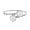 Simulated Pearl and Simulated Diamond Bypass Bangle Bracelet in Silvertone (7.0 In) 0.70 ctw - Sticky add to cart bar