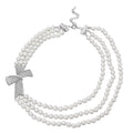 Simulated White Pearl and White Austrian Crystal Triple Row Necklace 20-23 Inches with Bow Clasp in Silvertone - Sticky add to cart bar