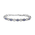 Tanzanite and White Zircon Bracelet in Platinum Over Sterling Silver (6.50 In) 2.50 ctw - Sticky add to cart bar