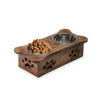 NAKKASHI, Hand Carved, Mango Wood Pet Feeder with Stainless Steel Bowls. Finish: White. Size: Approx. 18L X 7.5W X 5H inch. Bowl: Approx. Diameter 6.5 inch, depth: 2.5 inch.