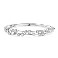 Moissanite Bangle Bracelet in Platinum Over Sterling Silver (7.50 In) 2.10 ctw