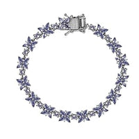 Tanzanite and White Zircon 10.20 ctw Cluster Bracelet in Rhodium Over Sterling Silver (7 In) (14.23 g)