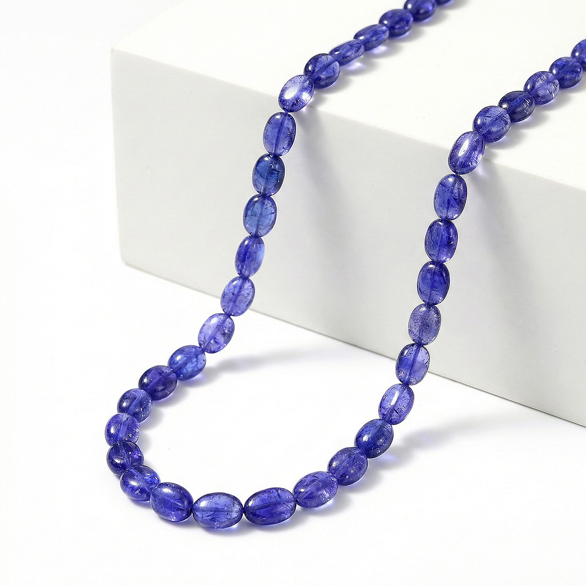 Certified & Appraised Rhapsody 950 Platinum AAAA Tanzanite Beaded Graduated Necklace 18 Inches with 2 Inch Extender 130.00 ctw