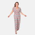 Tamsy Navy Floral Smocked Waist Jumpsuit with Flutter Sleeve - One Size Fits Most - Sticky add to cart bar
