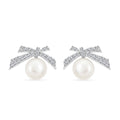 Freshwater Pearl and Simulated Diamond Bow Stud Earrings in Rhodium Over Sterling Silver 0.25 ctw - Sticky add to cart bar