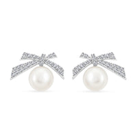 Freshwater Pearl and Simulated Diamond Bow Stud Earrings in Rhodium Over Sterling Silver 0.25 ctw
