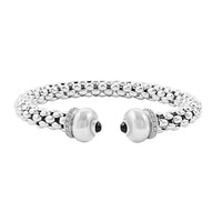 Italian Black Onyx, Simulated Diamond Bangle Bracelet in Sterling Silver (6.50 In) 1.50 ctw