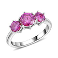 Pink Moissanite (Rnd 6.5mm) Trilogy Ring in Vermeil RG Over Sterling Silver (Size 7.0) 1.85 ctw - Sticky add to cart bar