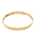 Italian 10K Yellow Gold 6.9mm Diamond-Cut Flex Bangle Bracelet (6.50 In) 3.50 Grams - Sticky add to cart bar