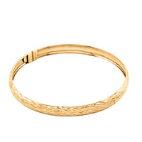 Italian 10K Yellow Gold 6.9mm Diamond-Cut Flex Bangle Bracelet (6.50 In) 3.50 Grams