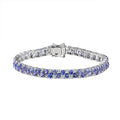 Tanzanite and White Zircon 11.75 ctw Bracelet in Rhodium Over Sterling Silver (7.25 In) - Sticky add to cart bar