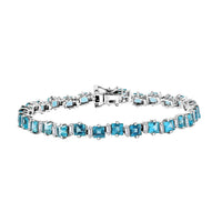 Premium Betroka Blue Apatite and Moissanite 12.50 ctw Bracelet in Rhodium Over Sterling Silver (7.25 In)