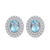 Blue Topaz and Simulated Diamond 3.85 ctw Earrings in Silvertone