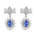 D'Joy Ceylon Blue Sapphire and White Zircon 1.20 ctw Bow Earrings in Rhodium Over Sterling Silver - Sticky add to cart bar