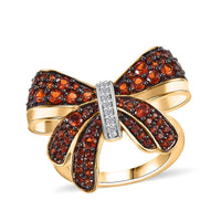 Karis Mozambique Garnet, White Zircon Bow Knot Ring in 18K YG Plated (Size 10.0) 1.15 ctw
