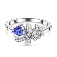 Tanzanite, White Zircon Love Knot Ring in Rhodium Over Sterling Silver (Size 10.0) 1.10 ctw